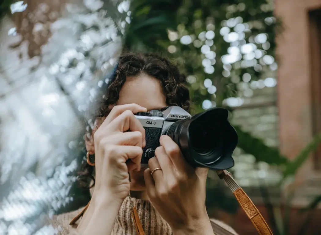 Photo of a girl taking a photo